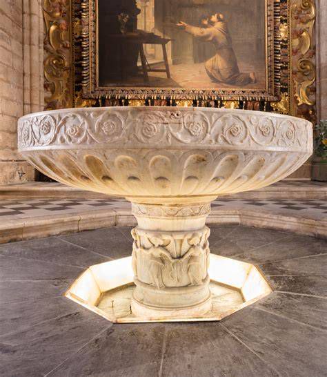 iglesia con pila bautismal: símbolo del sacramento