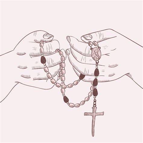 rosario y camándula; manos sosteniendo un rosario frente a un crucifijo