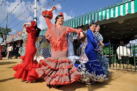 pareja bailando sevillanas en la Feria de Abril