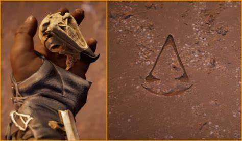 calavera de águila en la arena - escena de Assassin's Creed Origins